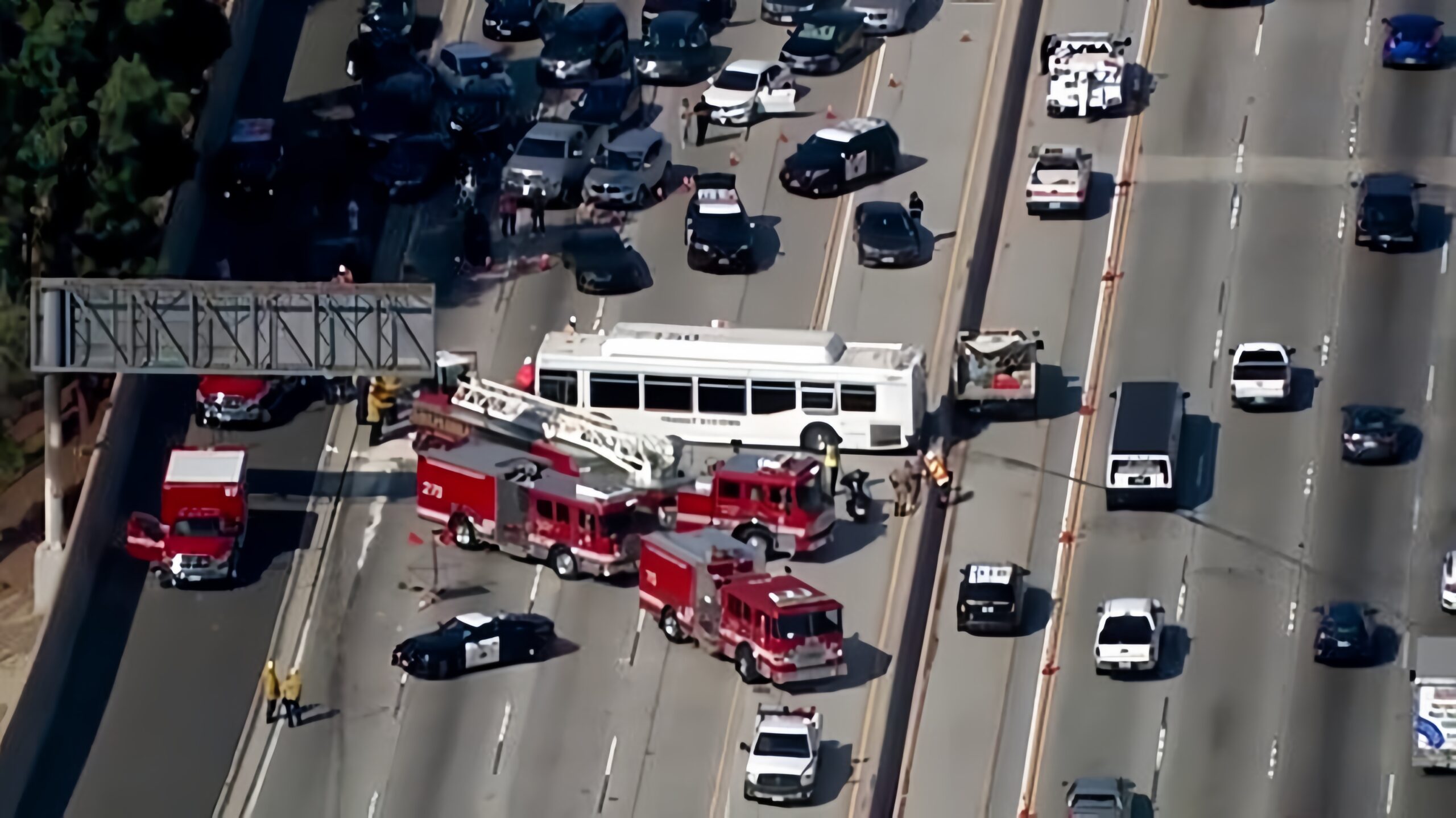 Image: Emergency responders working at the scene of the crash on I-405.